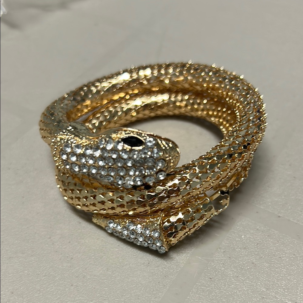 Gold tone and Silvery Serpent Bracelet with Sparkling Embellishments